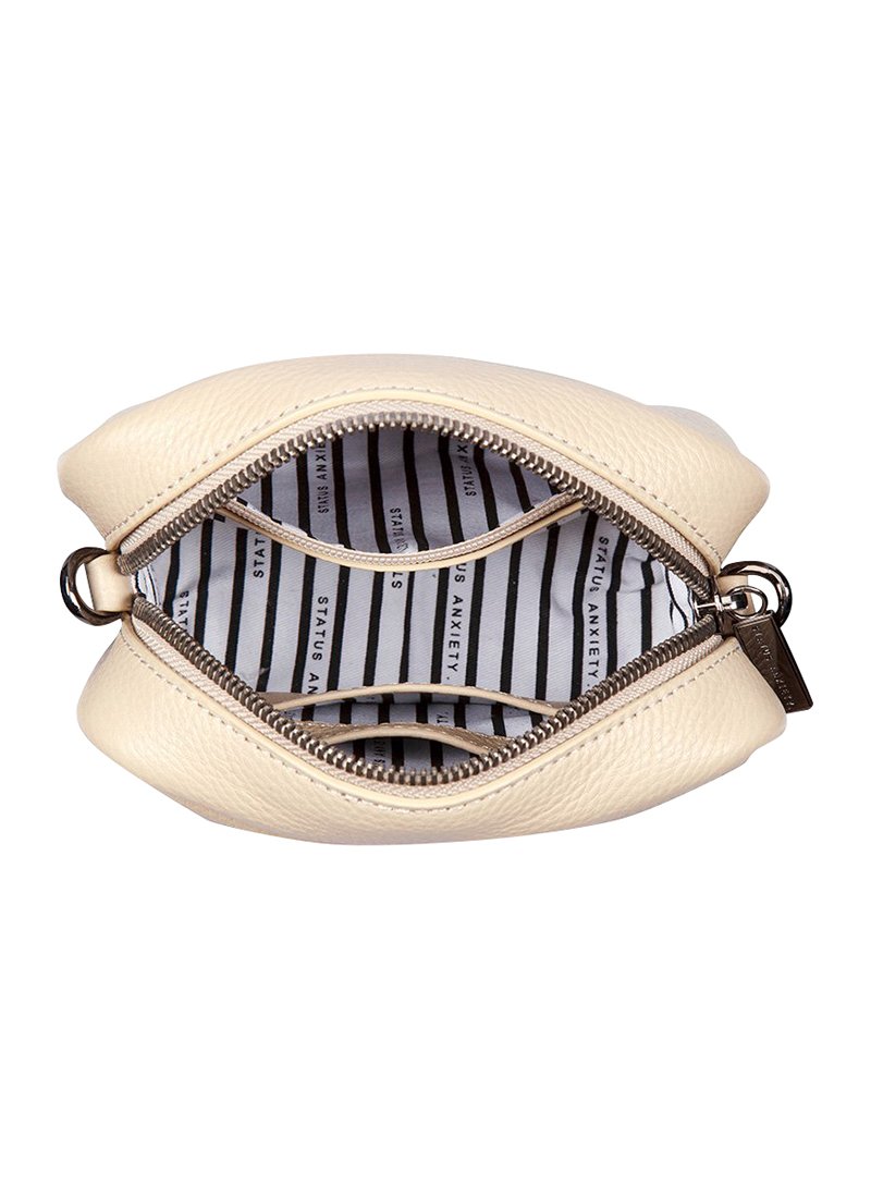 Understand and buy > status anxiety cult > disponibile